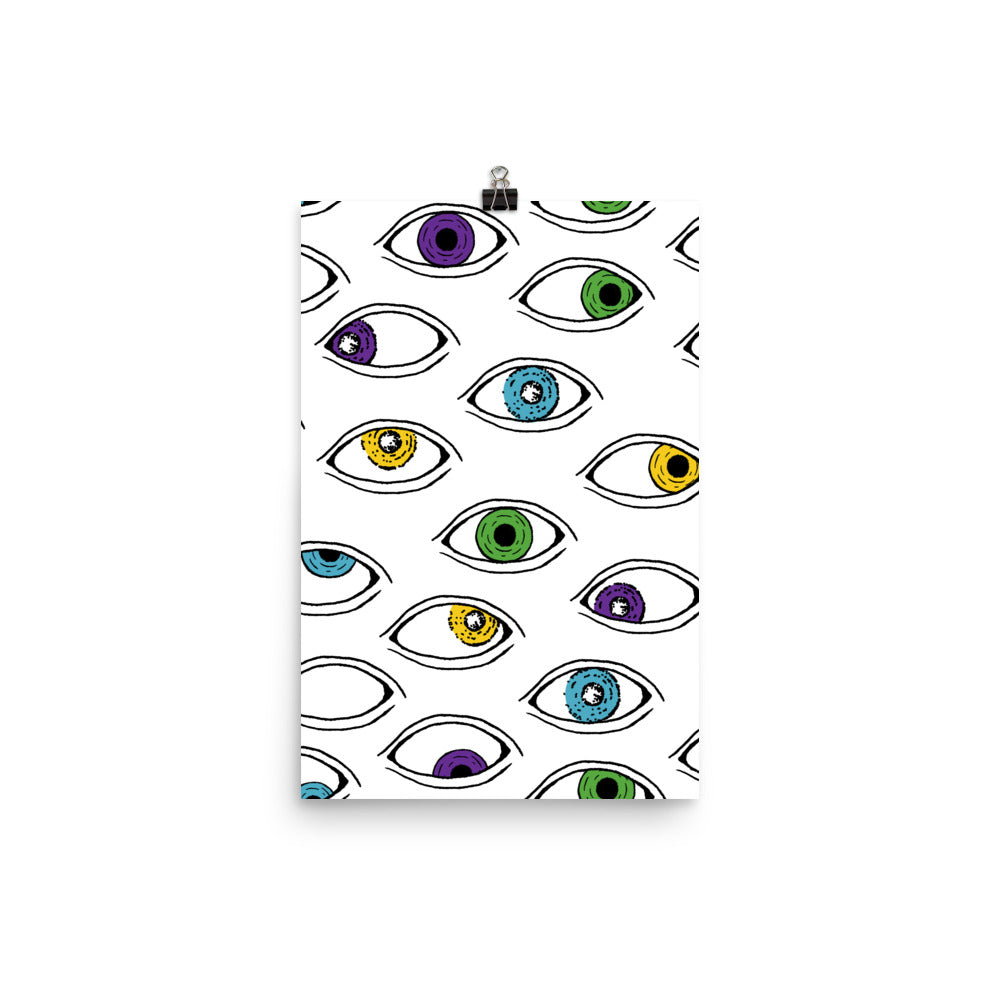 Eyes of the Beholder is an illustrated print that will bring color and pattern into your home or office space. Unique, yet fun, this artwork toes the line between weird in a quirky cute way and a strange eerie way. The perfect mix of light and dark, strange and cute, & brightly colorful yet not too vibrant.